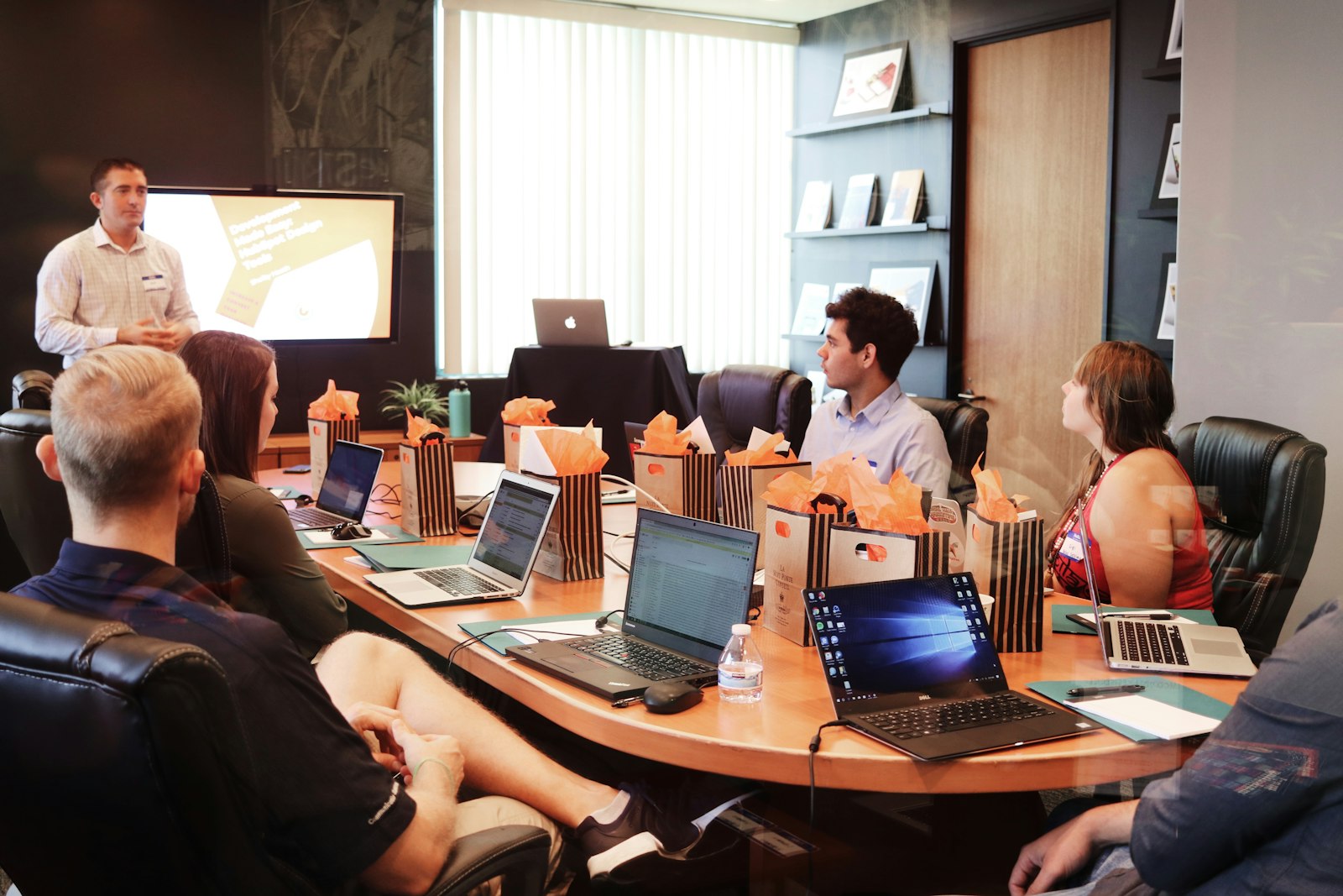 Sales manager presenting to a team
